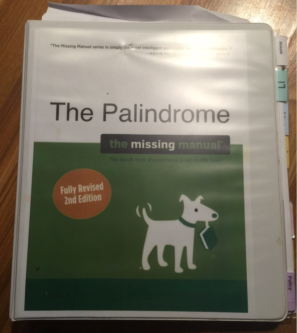 Binder labeled "The Palindrome: The Missing Manual"