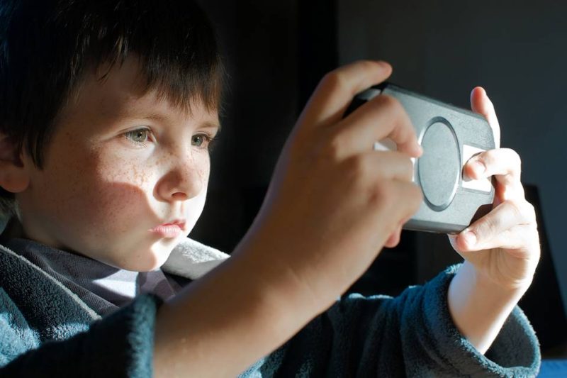 boy with device