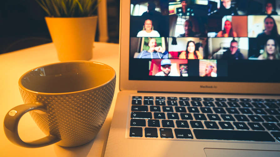 laptop showing online meeting